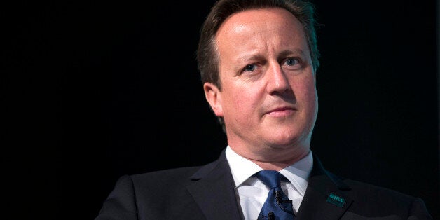 Prime Minister David Cameron during the Girl Summit 2014 at Walworth Academy, London, where he announced parents who fail to prevent their daughter being subjected to female genital mutilation (FGM) will face prosecution under new legislation.