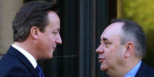 Embargoed to 0001 Sunday January 5.File photo dated 15/10/12 of Prime Minister David Cameron with Scotland's First Minister Alex Salmond (right) as Cameron has come under renewed pressure for a public debate with Salmond following his New Year anti-independence message and a new SNP poll which suggests a substantial number of British people want to see them go head-to-head on television.