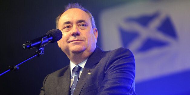 First Minister Alex Salmond making a speech during a march and rally in Edinburgh, calling for a Yes vote in next year's independence referendum. PRESS ASSOCIATION Photo. Picture date: Saturday September 21, 2013. The event appeared to draw crowds from across the country, with marchers filling the top half of the Royal Mile before wending their way along a city centre route. During the day, the gathered crowds were expected to hear speeches from key figures in the pro-independence movement such as First Minister Alex Salmond and his deputy Nicola Sturgeon. The campaigners gathered in the city's High Street before heading slowly along North Bridge, Waterloo Place and Regent Road towards the final destination of Calton Hill. A range of groups took part in the protest, from political parties to organisations such as Farming for YES and Football Supporters for Independence. See PA story POLITICS Scotland. Photo credit should read: Lesley Martin/PA Wire