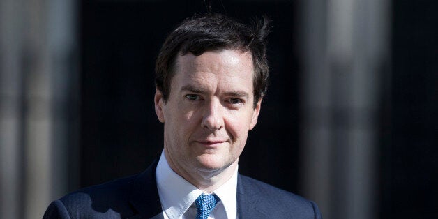 LONDON, ENGLAND - JUNE 10: Chancellor of the Exchequer George Osborne leaves Number 11 Downing Street on June 10, 2014 in London, England. Mr Osborne is due to announce this week new incentives for builders to develop derelict sites in towns and cities to help protect the green belt. (Photo by Oli Scarff/Getty Images)