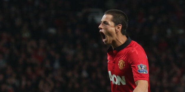 MANCHESTER, ENGLAND - SEPTEMBER 25: Javier 'Chicharito' Hernandez of Manchester United celebrates scoring their first goal during the Capital Cup Third Round match between Manchester United and Liverpool at Old Trafford on September 25, 2013 in Manchester, England. (Photo by John Peters/Man Utd via Getty Images)