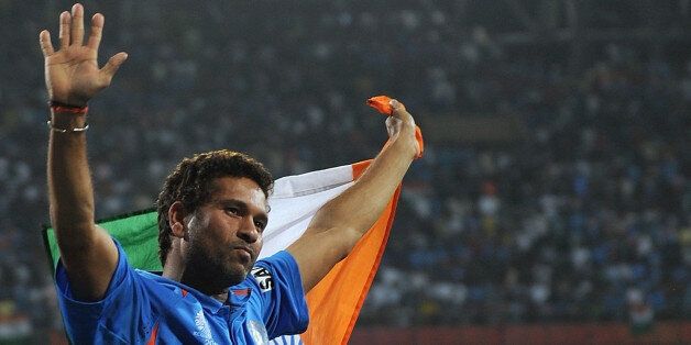 Indian cricketer Sachin Tendulkar waves the tricolor while celebrating victory during the final of ICC Cricket world Cup 2011 match between India and Sri Lanka at The Wankhede Stadium in Mumbai on April 2, 2011.India beat Sri Lanka by six wickets. AFP PHOTO/Prakash SINGH (Photo credit should read PRAKASH SINGH/AFP/Getty Images)