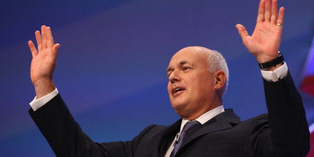 MANCHESTER, ENGLAND - OCTOBER 03: Iain Duncan Smith, Secretary of State for Work and Pensions takes applause after giving his his speech to delegates at the Conservative Party Conference on October,3 2011 in Manchester, England. Chancellor George Osborne will today announce his plans at the party conference to extend a council tax freeze in England. (Photo by Jeff J Mitchell/Getty Image)