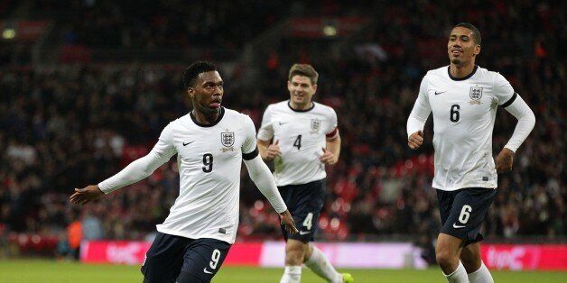 England's Daniel Sturridge (left) celebrates scoring his side's first goal of the game