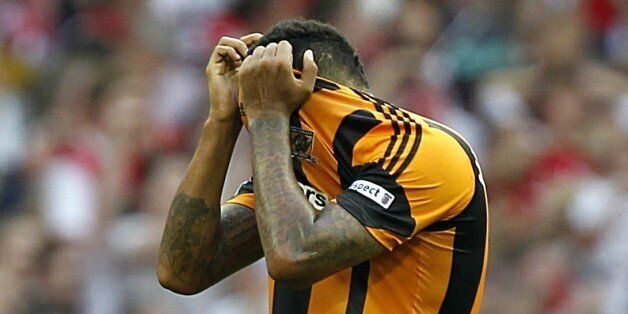 Hull City's Tom Huddlestone reacts after the game