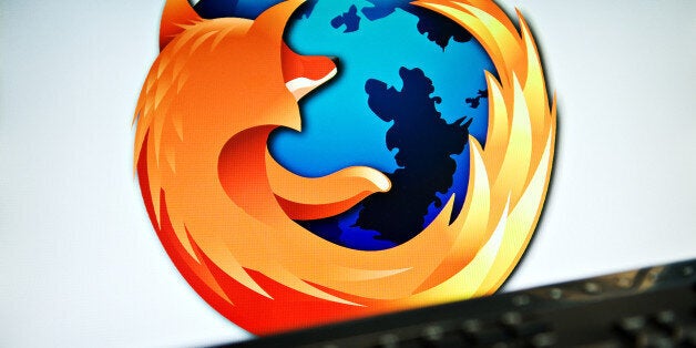 A screen displays the logo of the open-source web browser Firefox on July 31, 2009, in London, as the software edges towards it's billionth download within the next twenty four hours. First released in 2004, the browser currently holds around 31 % of the market share with Microsoft's Internet Explorer dominating the field with 60 %. AFP PHOTO/Leon Neal (Photo credit should read LEON NEAL/AFP/Getty Images)