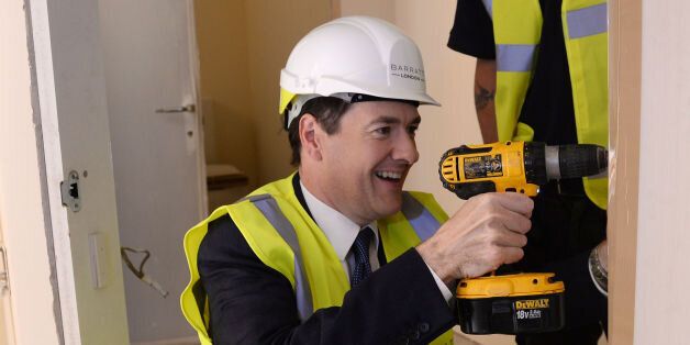 Chancellor George Osborne visits Barratt Homes Help to Buy housing development in Lewisham, south east London, where he helped to screw a hinge onto a door.