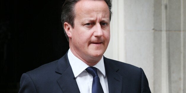 LONDON, ENGLAND - JULY 21: British Prime Minister David Cameron leaves Downing Street for Parliament on July 21, 2014 in London, England. Mr Cameron will be holding a National Security and COBRA meeting later. (Photo by Peter Macdiarmid/Getty Images)