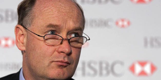 LONDON, United Kingdom: Douglas Flint, the Group Finance Director of HSBC Holdings plc attends a press conference in London, 06 March 2006. The Global banking giant HSBC on Monday announced record annual pre-tax profits for 2005, which climbed 11 percent to 20.97 billion US dollars (17.45 billion euros) compared with the previous year. The earnings result marked a record for HSBC, one of the world's biggest banking groups alongside US peers Citigroup and Bank of America, and beat analysts' con