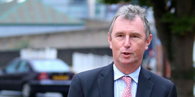 MP Nigel Evans arrives for a preliminary hearing at Preston Crown Court, he is accused of sex offences against seven men.