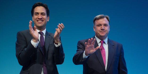 Labour Leader Ed Miliband (left) applauds shadow chancellor Ed Balls after he addressed delegates on the second day of the Labour Party Annual Conference in Brighton.