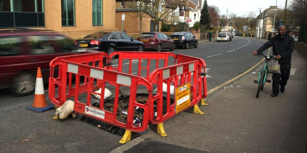 Stock image of police crime scene tape in Salford.