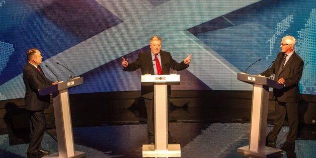 Scotland's First Minister Alex Salmond, broadcast journalist Bernard Ponsonby, and former chancellor, the leader of the pro-UK Better Together campaign Alistair Darling at a TV debate of the independence referendum campaign in Glasgow