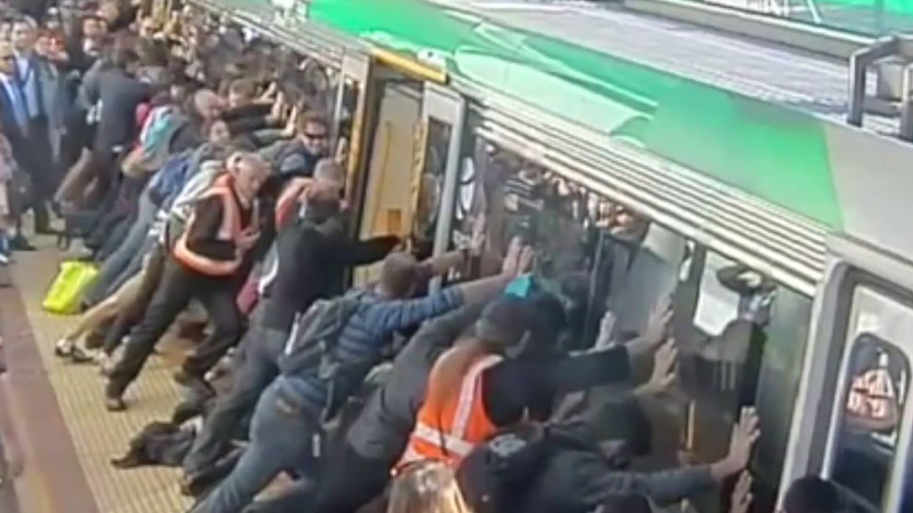 Australian Train Passengers Rally To Push Entire Train Carriage Off