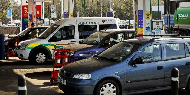 A Medical Services ambulance fills up after queuing at a Tesco petrol station in Eastville, Bristol, after sales of petrol and diesel increased dramatically yesterday as motorists flocked to garages to fill up following controversial advice from the Government ahead of a possible strike by fuel tanker drivers.
