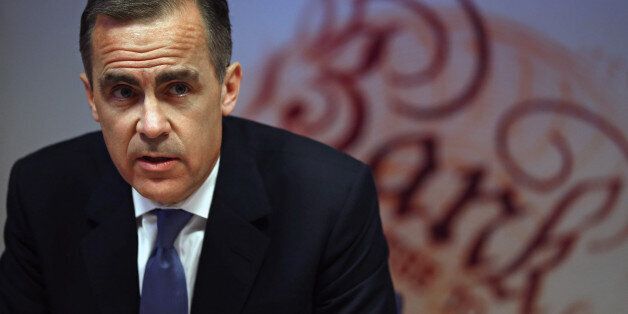 Governor of the Bank of England Mark Carney speaks during the bank's inflation report news conference in London on February 12, 2014. The Bank of England ramped up its 2014 British economic growth forecast, and tweaked its forward guidance on interest rates. Gross domestic product was set to grow by 3.4 percent this year, a chart in the bank's latest report showed. AFP PHOTO/POOL/ Dan Kitwood (Photo credit should read Dan Kitwood/AFP/Getty Images)