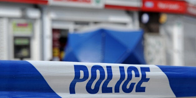 File image: Police tape outside a shop