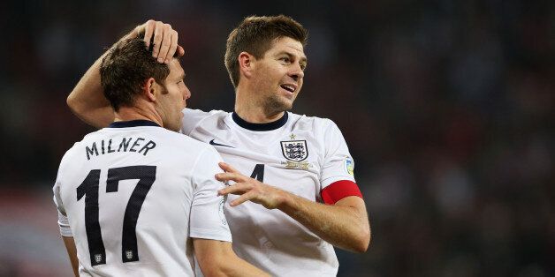 LONDON, ENGLAND - OCTOBER 15: James Milner and Steven Gerrard of England celebrate at the final whistle during the FIFA 2014 World Cup Qualifying Group H match between England and Poland at Wembley Stadium on October 15, 2013 in London, England. (Photo by Scott Heavey - The FA/The FA via Getty Images)