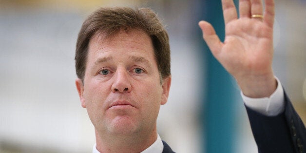 LONDON, ENGLAND - OCTOBER 08: Deputy Prime Minister Nick Clegg gestures as he speaks at the Buhler Sortex factory on October 8, 2013 in east London, England. Mr Clegg gave a speech on Britain and Europe to reporters and workers. (Photo by Peter Macdiarmid/Getty Images)