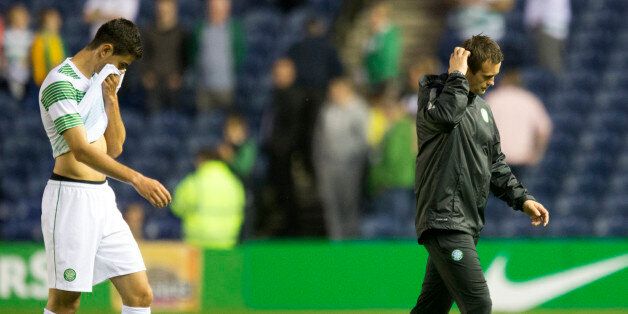 Celtic Nir Bitton and manager Ronny Deila (right) after the Champions League Qualifying at Murrayfield, Edinburgh.