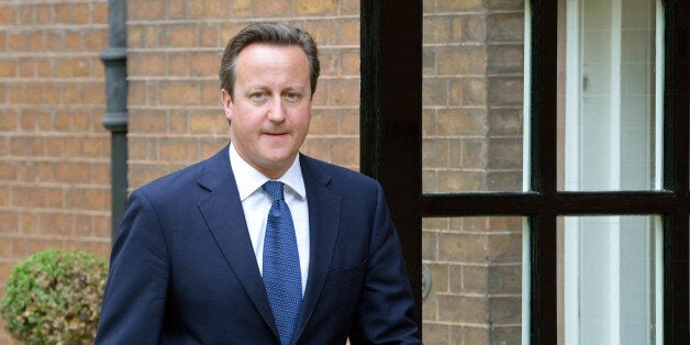 British Prime Minister David Cameron speaks during a media conference after an EU summit in Brussels on Friday, June 27, 2014. European Union leaders have nominated former Luxembourg Prime Minister Jean-Claude Juncker to become the 28-nation blocâs new chief executive. Junckerâs nomination is breaking with a decades-old tradition of choosing the Commission president by consensus because Britain opposed him. (AP Photo/Yves Logghe)