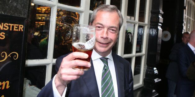 Ukip leader Nigel Farage has a pint in the Westminster Arms, London, as he celebrates his partyÕs results in the polls for the European Parliament.