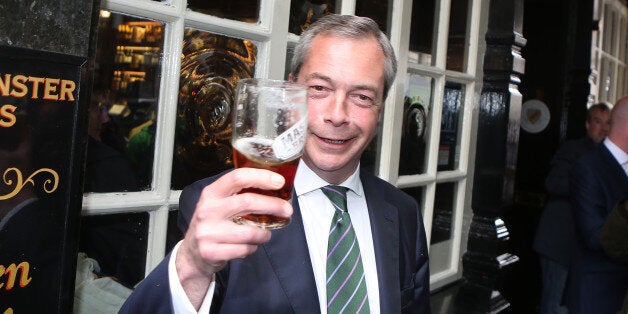 Ukip leader Nigel Farage has a pint in the Westminster Arms, London, as he celebrates his partyÕs results in the polls for the European Parliament.