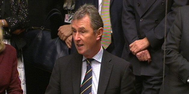 MP Nigel Evans asks a question during Prime Minister's Questions in the House of Commons, London.