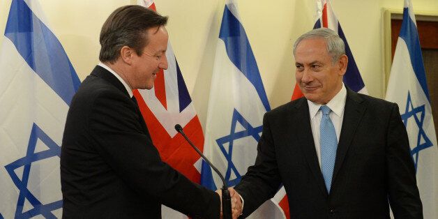 Prime Minister David Cameron is greeted by Israeli Prime Minister Benjamin Netanyahu at his office in Jerusalem on the first of a two day visit to Israel.