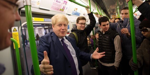 London Mayor Boris Johnson takes the tube on the District Line to Southfields where he met the founders of the footwear company Gandys Flip Flop, it is the second day of a 48 hour shut down of some of the underground network in London due to industrial action over the closing of ticket offices.