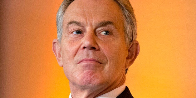 Tony Blair, former U.K. prime minister, listens during the World Food Prize Borlaug Dialogue in Des Moines, Iowa, U.S., on Thursday, Oct. 17, 2013. The World Food Prize is an international award recognizing the achievements of individuals who have advanced human development by improving the quality, quantity or availability of food in the world. Photographer: Daniel Acker/Bloomberg via Getty Images