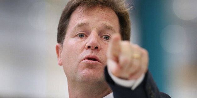 LONDON, ENGLAND - OCTOBER 08: Deputy Prime Minister Nick Clegg gestures as he speaks at the Buhler Sortex factory on October 8, 2013 in east London, England. Mr Clegg gave a speech on Britain and Europe to reporters and workers. (Photo by Peter Macdiarmid/Getty Images)