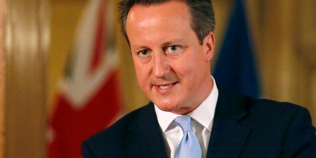 Prime Minister David Cameron during a joint news conference with Nato Secretary General Anders Fogh Rasmussen (not pictured) in Downing Street, central London.