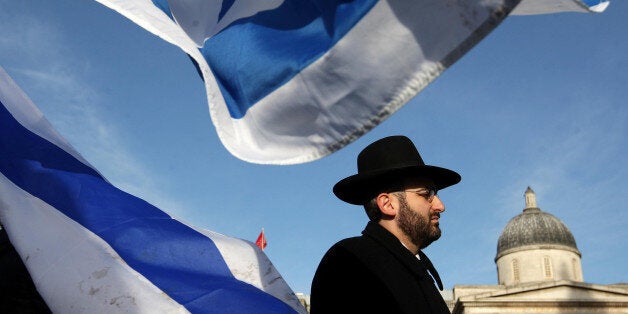 A pro-Israeli demonstrator takes part in a pro-Israeli rally in Trafalgar Square, London.