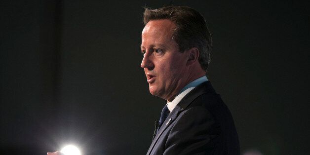 Prime Minister David Cameron speaks during the Girl Summit 2014 at Walworth Academy, London, where he announced parents who fail to prevent their daughter being subjected to female genital mutilation (FGM) will face prosecution under new legislation.