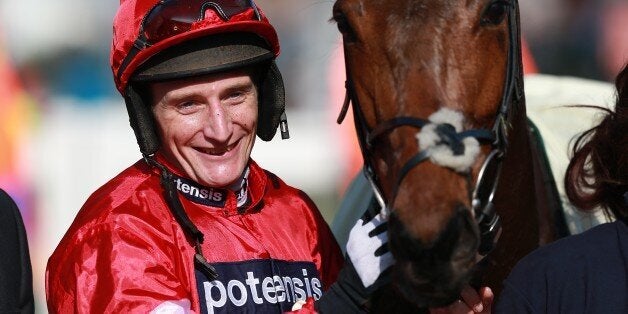 Jockey Daryl Jacob with Lac Fontana after winning the Vincent O'Brien County Handicap Hurdle on Gold Cup Day, during the Cheltenham Festival.