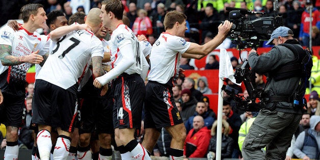 MANCHESTER, ENGLAND - MARCH 16: (THE SUN OUT, THE SUN ON SUNDAY OUT) Steven Gerrard of Liverpool celebrates after scoring from the spot for the second time during the Barclays Premier Leauge match between Manchester United and Liverpool at Old Trafford on March 16, 2014 in Manchester, England. (Photo by John Powell/Liverpool FC via Getty Images)