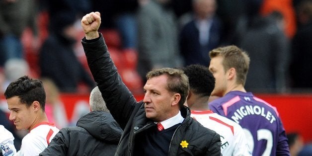 MANCHESTER, ENGLAND - MARCH 16: (THE SUN OUT, THE SUN ON SUNDAY OUT) Brendan Rodgers manager of Liverpool celebrates after winning the Barclays Premier Leauge match between Manchester United and Liverpool at Old Trafford on March 16, 2014 in Manchester, England. (Photo by Andrew Powell/Liverpool FC via Getty Images)