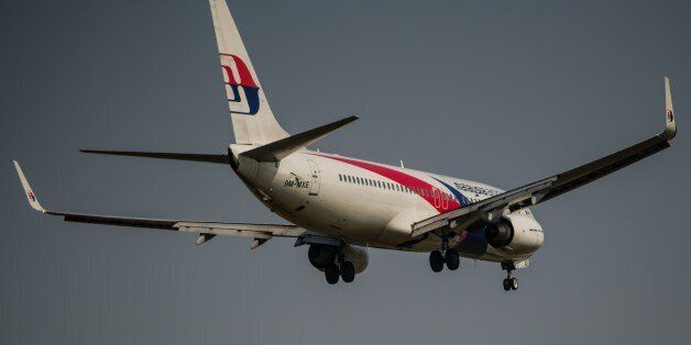 A Malaysia Airlines plane prepares for landing at the Kuala Lumpur International Airport in Sepang