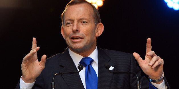 Australia's Prime Minister Tony Abbott speaks during a ceremony of the one year countdown to the ICC Cricket World Cup 2015 in Sydney on February 14, 2014. The World Cup will be held from February 14 to March 15, 2015 with 49 matches played in 14 venues across the two host nations, Australian and New Zealand. AFP PHOTO / Saeed KHAN (Photo credit should read SAEED KHAN/AFP/Getty Images)