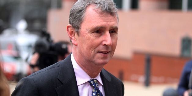 Nigel Evans, 56, of Pendleton, Lancashire, the former deputy speaker of the House of Commons (centre front ) arrives at Preston Crown Court where he faces nine charges, dating from 2002 to April 1, last year of sexual offences against seven men.