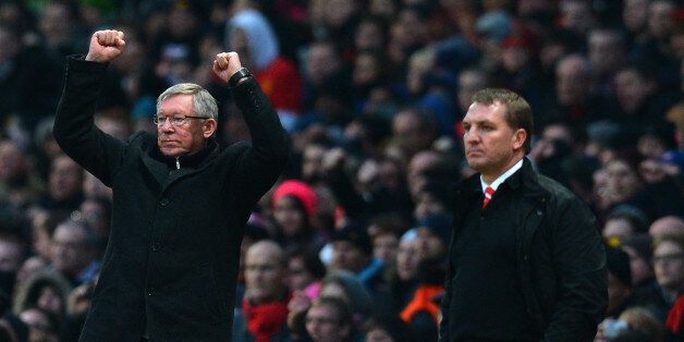 Manchester United's Scottish manager Alex Ferguson (L) celebrates next to Liverpool's Northern Irish manager Brendan Rodgers (R) during the English Premier League football match between Manchester United and Liverpool at Old Trafford in Manchester, northwest England, on January 13, 2013. AFP PHOTO/ANDREW YATES == RESTRICTED TO EDITORIAL USE. No use with unauthorized audio, video, data, fixture lists, club/league logos or ?live? services. Online in-match use limited to 45 images, no video emulat