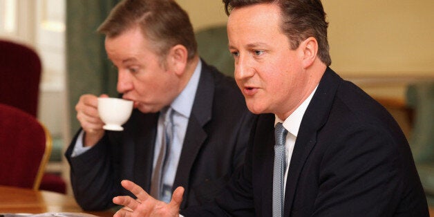 LONDON, ENGLAND - JANUARY 17: British Prime Minister David Cameron (R) and Education Secretary Michael Gove (L) attend a meeting on education in Number 10 Downing Street on January 17, 2012 in London, England. The meeting brought together educational professionals with experience of improving pupil underperformance and included Ofsted's Chief Inspector, Sir Michael Wilshaw. (Photo by Oli Scarff - WPA-Pool/Getty Images)