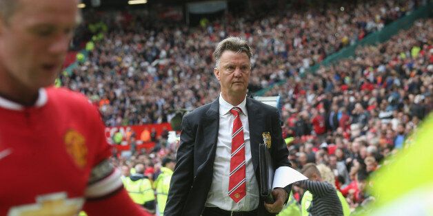 MANCHESTER, ENGLAND - AUGUST 16: Manager Louis van Gaal of Manchester United walks off after the Premier League match between Manchester United and Swansea City at Old Trafford on August 16, 2014 in Manchester, England. (Photo by John Peters/Man Utd via Getty Images)