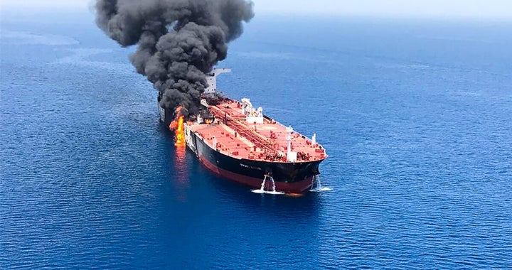 A picture obtained by AFP from Iranian News Agency ISNA on June 13, 2019, shows fire and smoke billowing from the Norwegian-owned Front Altair tanker said to have been attacked in the waters of the Gulf of Oman.