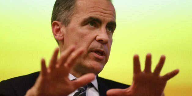 Bank of England Governor Mark Carney addresses the audience after his public speech on 'One Mission. One Bank. Promoting the good of the people of the United Kingdom' at the Cass Business School in London, on March 18, 2014. AP PHOTO / SANG TAN/POOL (Photo credit should read SANG TAN/AFP/Getty Images)
