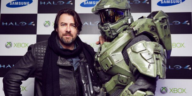 LONDON, ENGLAND - NOVEMBER 05: Jonathan Ross and Master Chief attend the launch of Halo 4 on Xbox 360 at Tower Bridge on November 05, 2012 in London, England. The 'Halo 4' Glyph symbol is one of the largest and brightest man-made structures to ever fly over a capital city and measures 50 feet in diameter and weighs over three tons. ( Photo by Halo by Xbox360 via Getty Images )