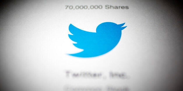 The Twitter Inc. logo is displayed on the company's preliminary prospectus arranged for a photograph in Washington, D.C., U.S., on Monday, Oct. 28, 2013. Twitter Inc., which embarks on its road show to investors today, will make the case to potential investors in its initial public offering that it needs to keep spending to grow, and profit will come once it can reap the benefits of those investments. Photographer: Andrew Harrer/Bloomberg via Getty Images