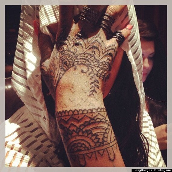 rihanna hand tattoo