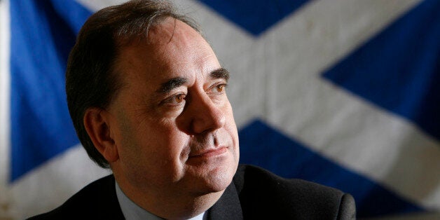 UNITED KINGDOM - JANUARY 31: Alex Salmon, Leader of the Scottish National Party poses with the Saltire flag, the national flag of Scotland in the background at their headquarters in Edinburgh, Scotland, U.K., Tuesday, Jan. 30, 2007. As if Chancellor of the Exchequer Gordon Brown didn't have enough to worry about, his Scottish homeland may be about to vote for a party that wants to disunite the United Kingdom. (Photo by Mike Wilkinson/Bloomberg via Getty Images)